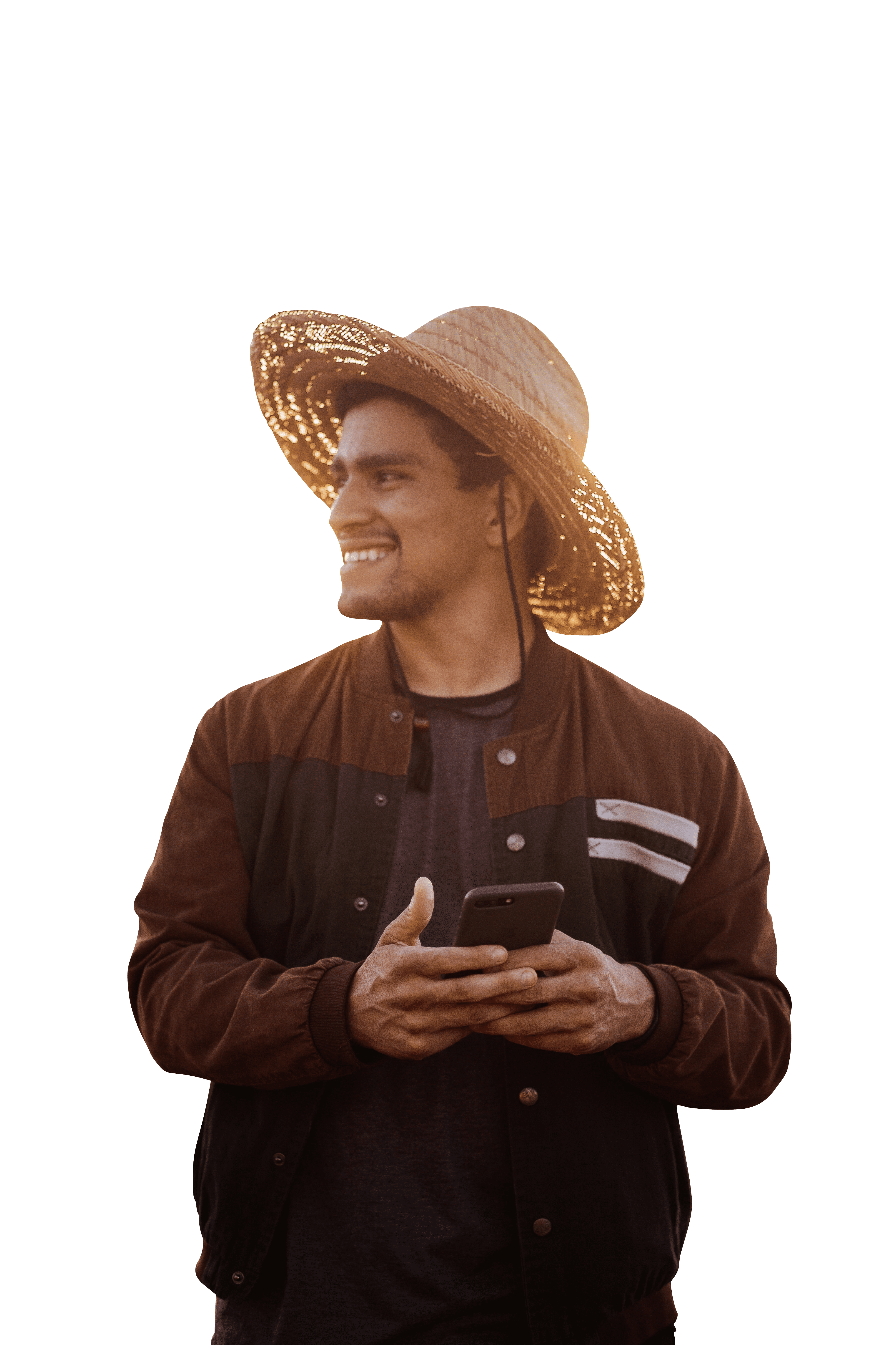 Attractive stylish young man wearing hat holding cellphone while walking outdoors transparent background.png