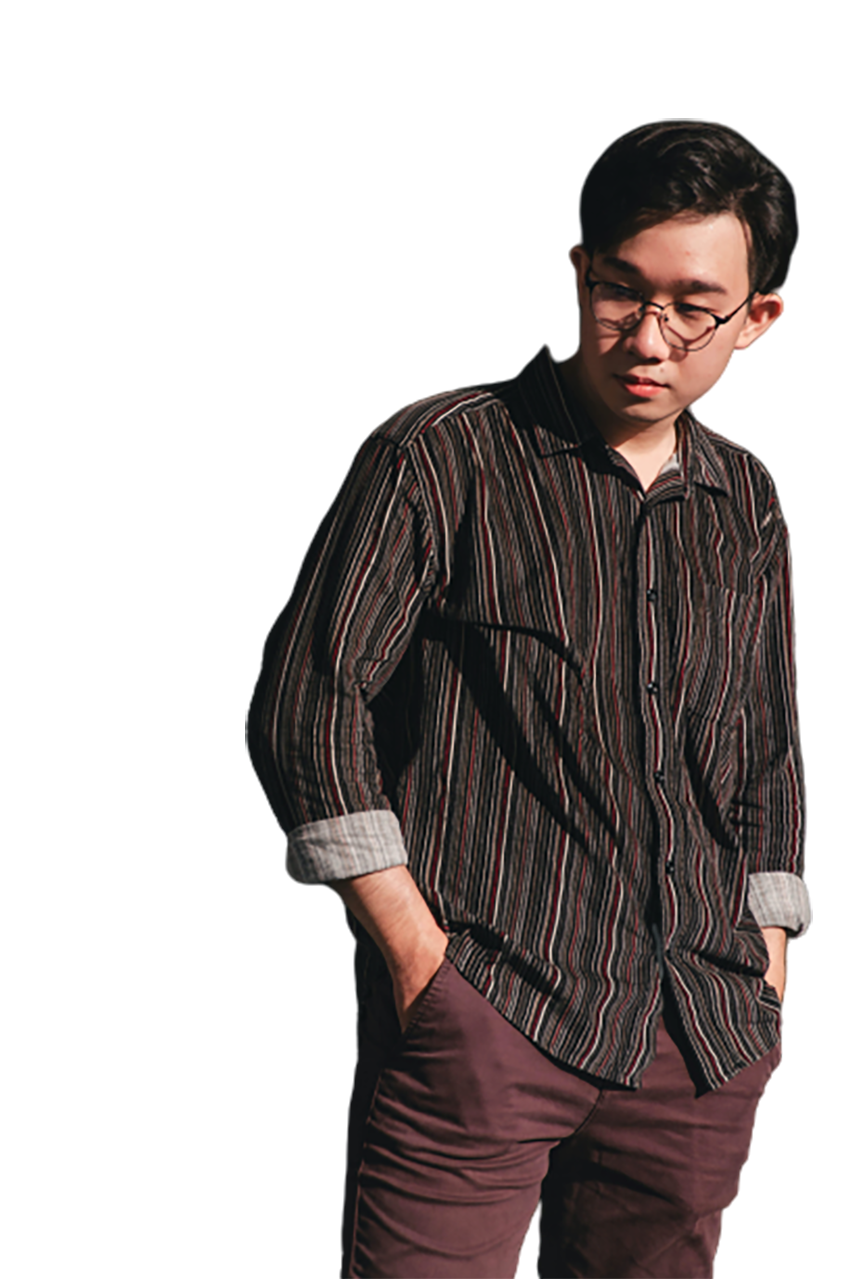 An Asian boy looking down