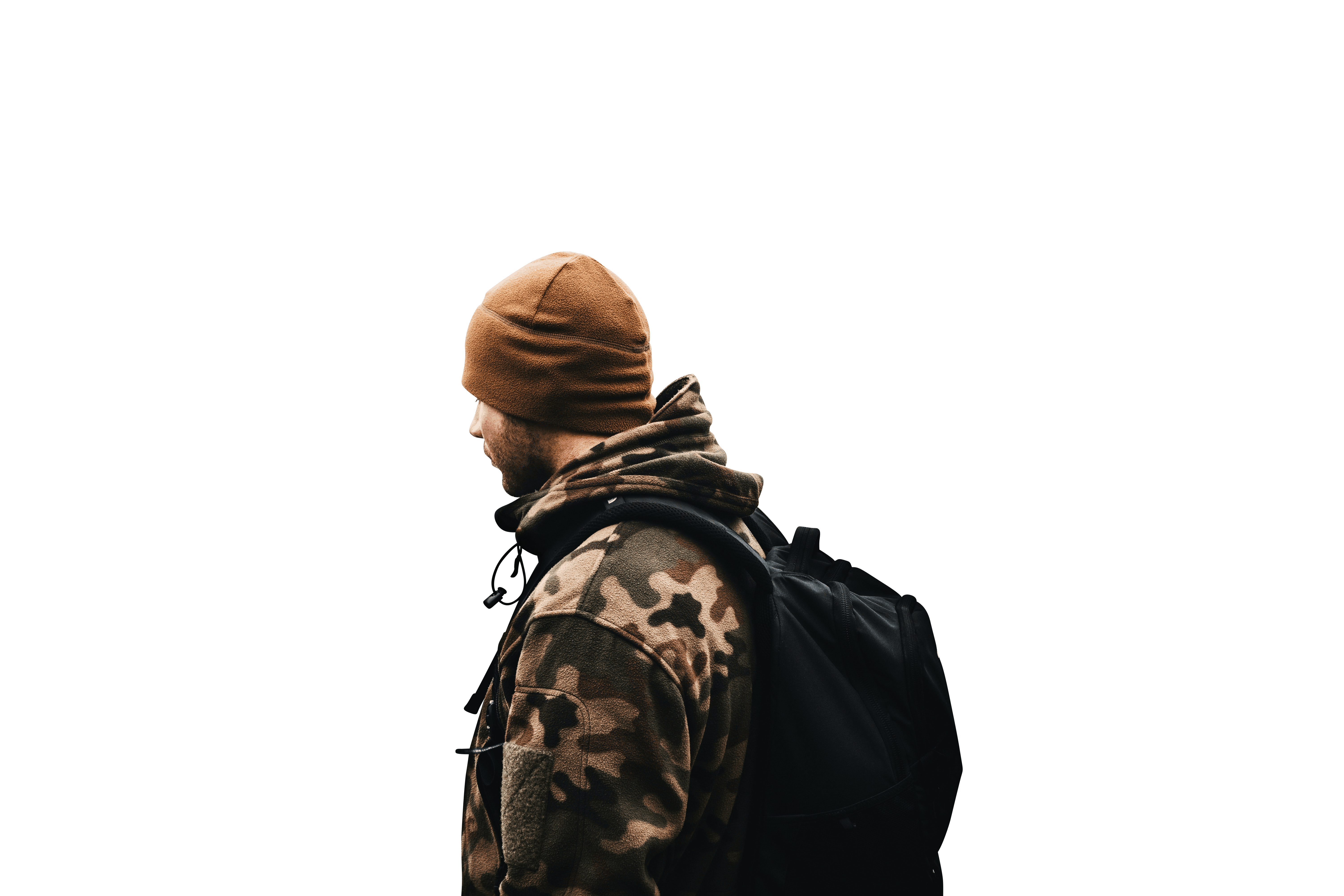 A man dressed in a winter jacket and scarf back view transparent background.png